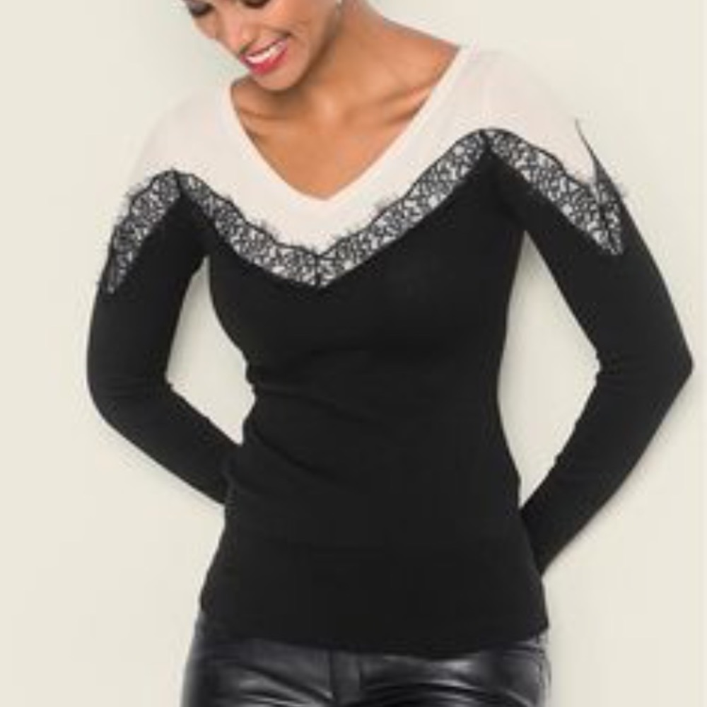 Black and white lace sweater sold by Venus